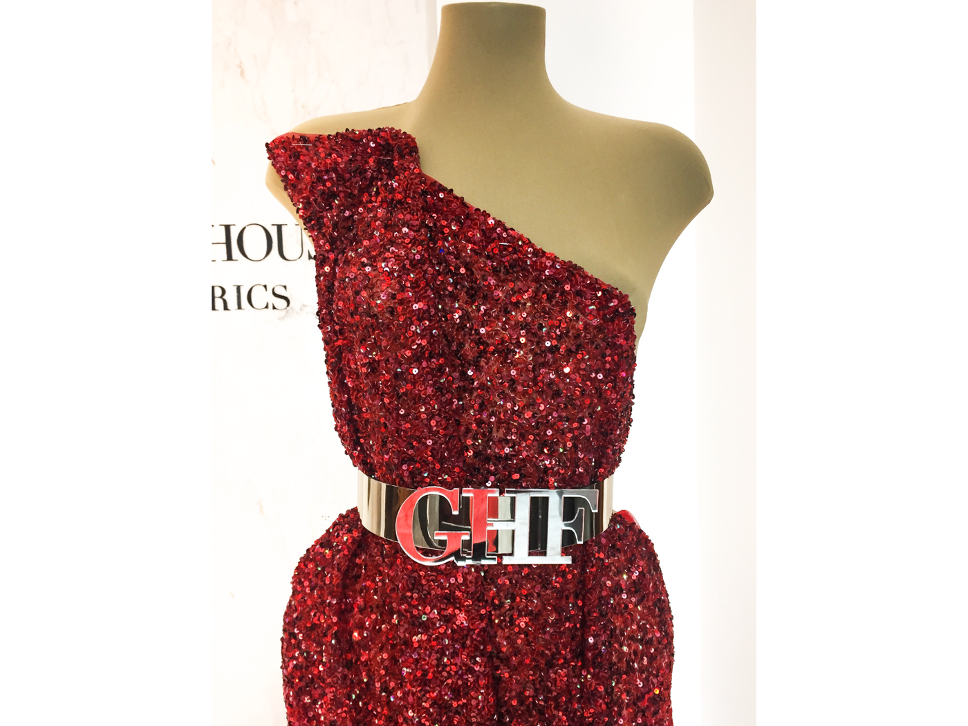 Red dress made with handmade sequins lace | Glam House Fabrics